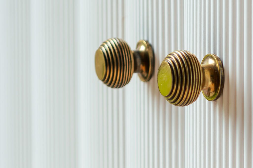 Brass door knobs, bespoke joinery, hardware